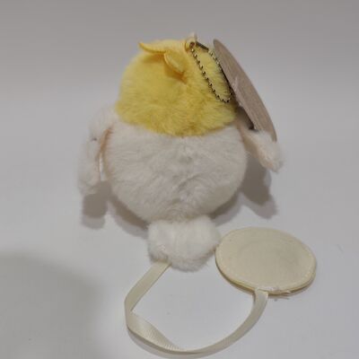 ของเล่นแม็กเนติคอคคาติเล่ห์ที่ยืนอยู่บนไหล่